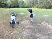 Porks playing from a "bunker" in the fairway on the 8th